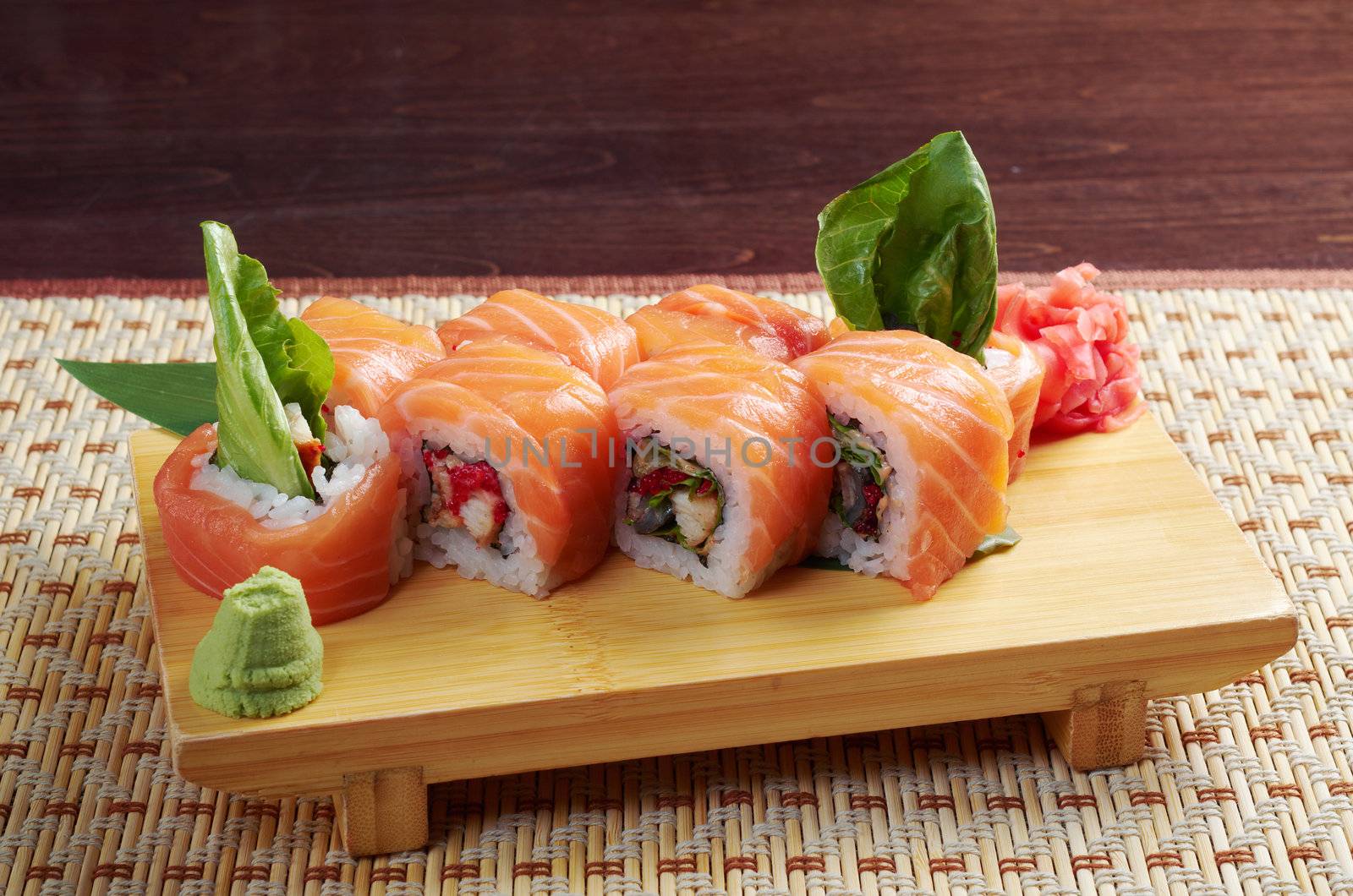Uramaki. Philadelphia classic. Salmon, Philadelphia cheese, cucumber, avocado, tobiko. Japanese sushi
