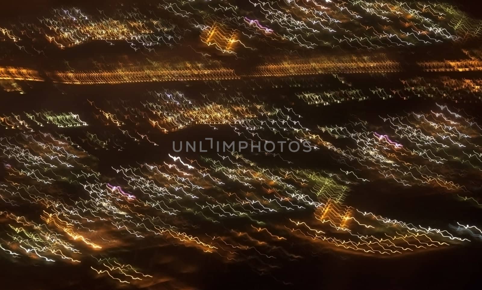 Night view of the city from an airplane taking off. Collage