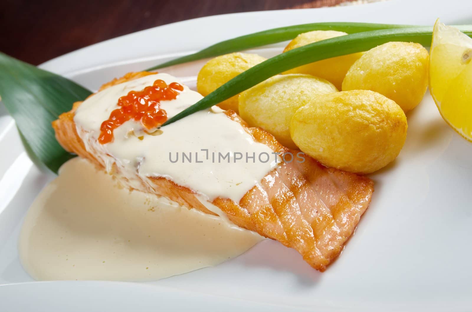 Salmon  with potato .cream sauce.Shallow depth-of-field