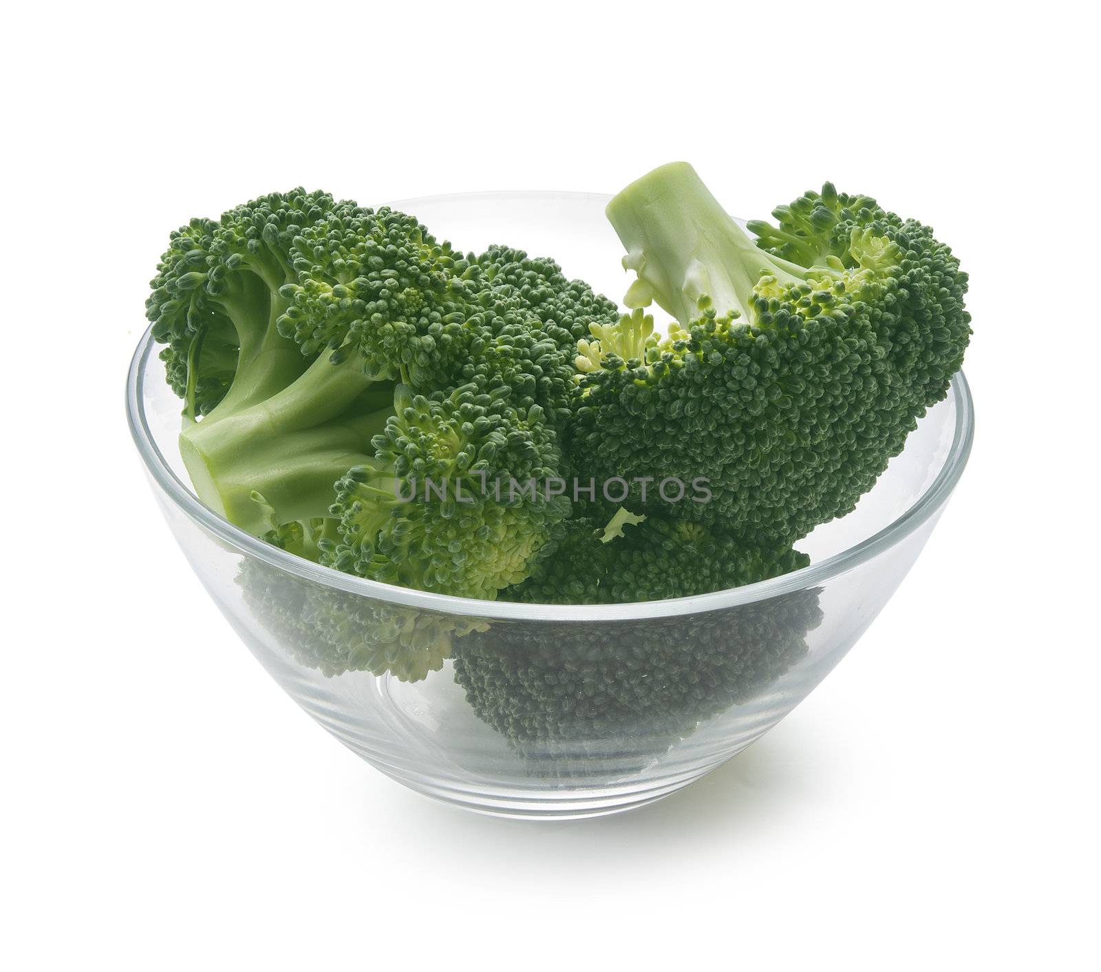 Some pieces of broccoli in the glass bowl