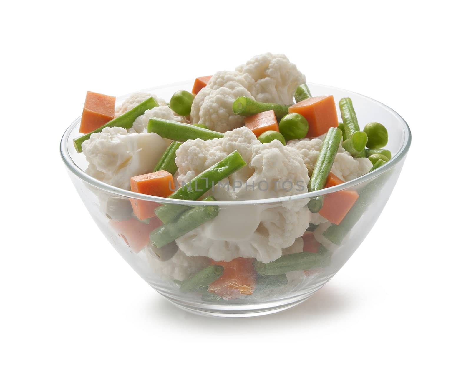 Vegetable mix with cauliflower, peas, carrot and kidney bean in the glass bowl
