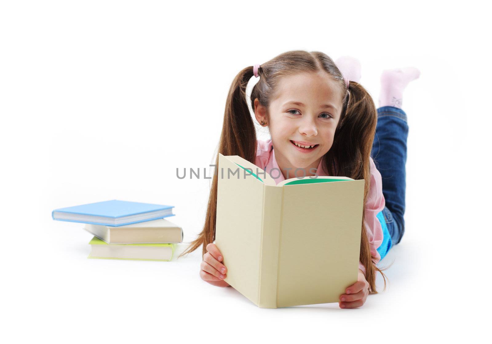 Schoolgirl with book on white background