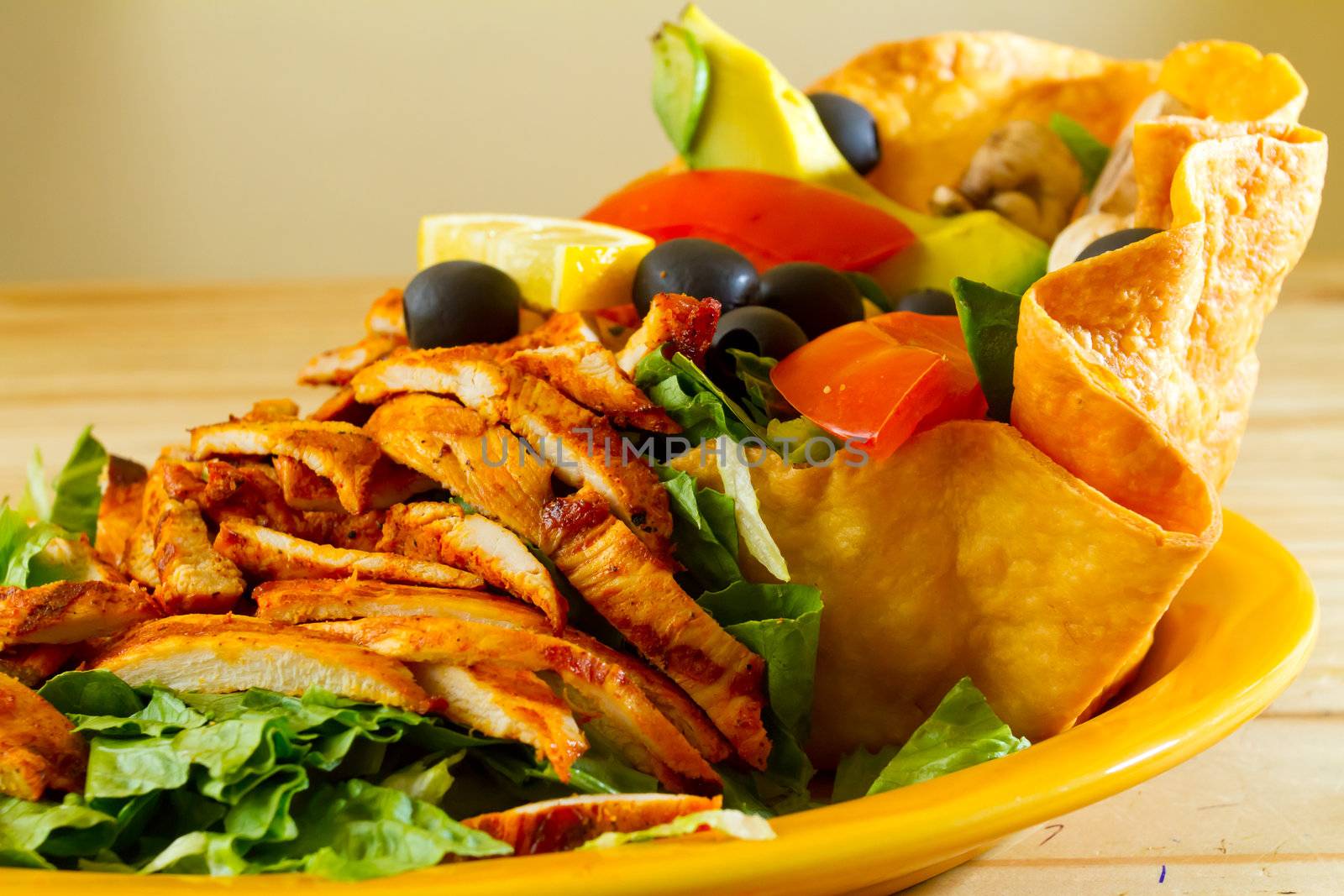 A salad at a Mexican restaurant ready to be served.