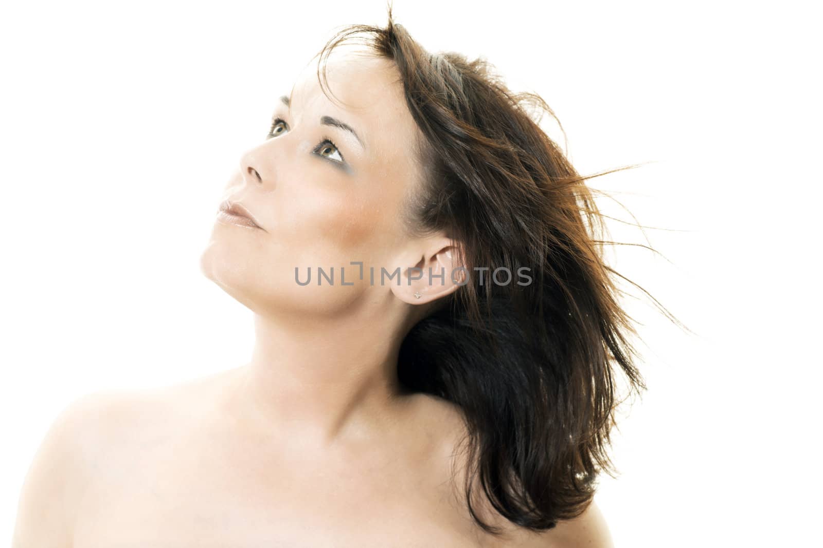 attractive woman gazing upwards isolated on white
