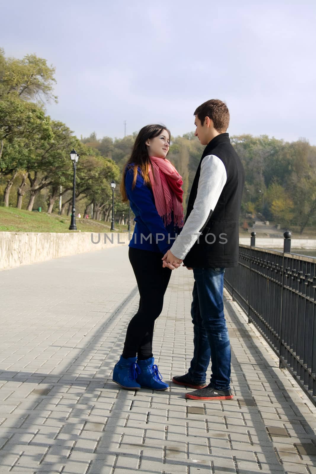 Young couple standing on street