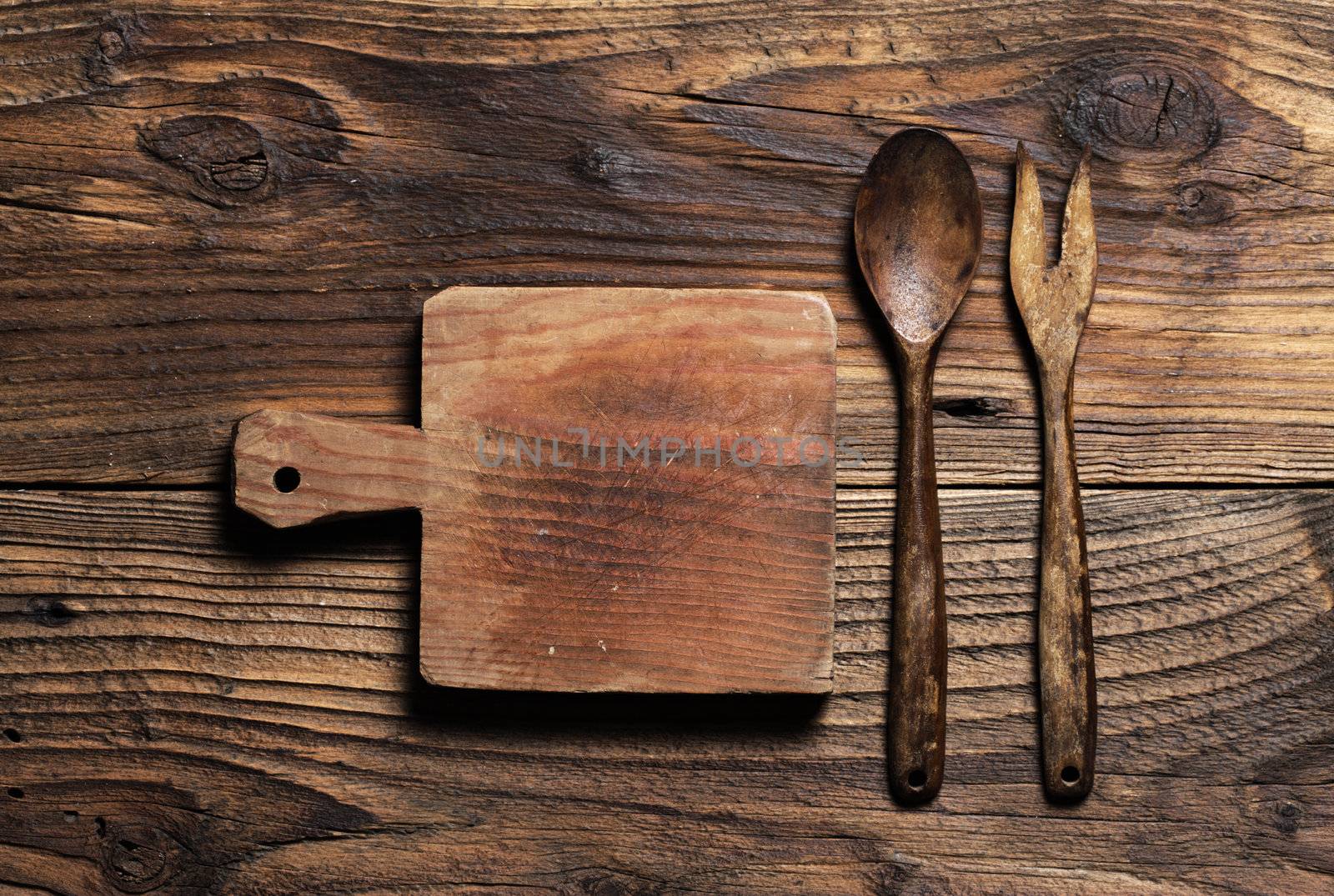 wooden kitchen accessories on wood background