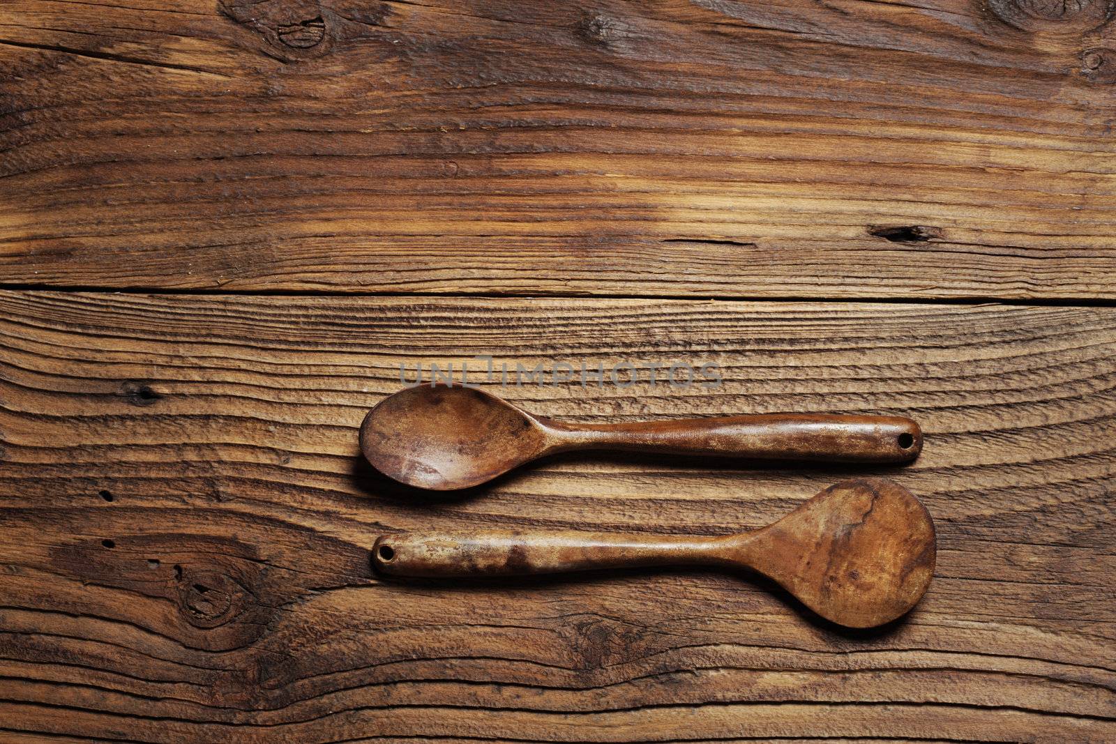 wooden kitchen accessories on wood background