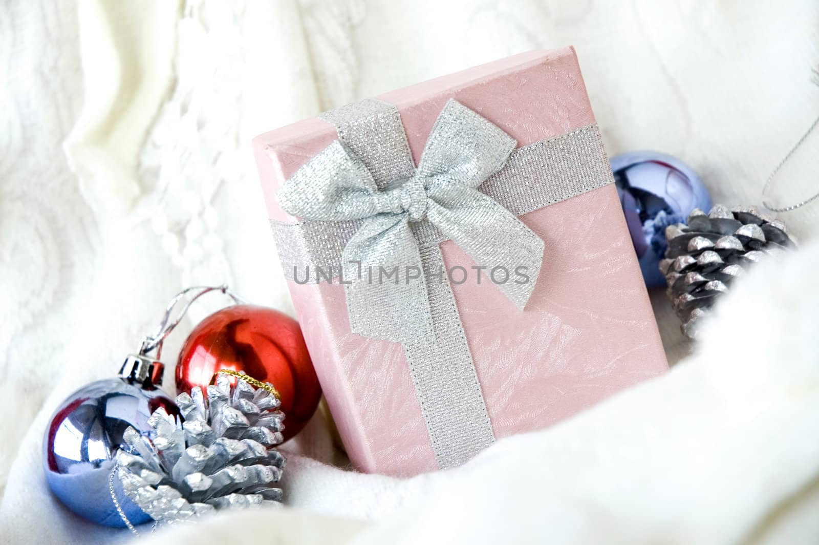gift box put on white clothing with christmas ornament