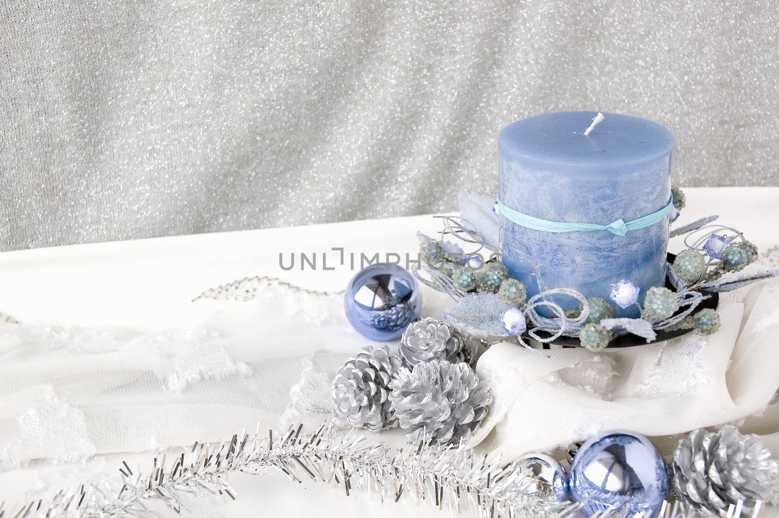 blue candle on christmas decoration background