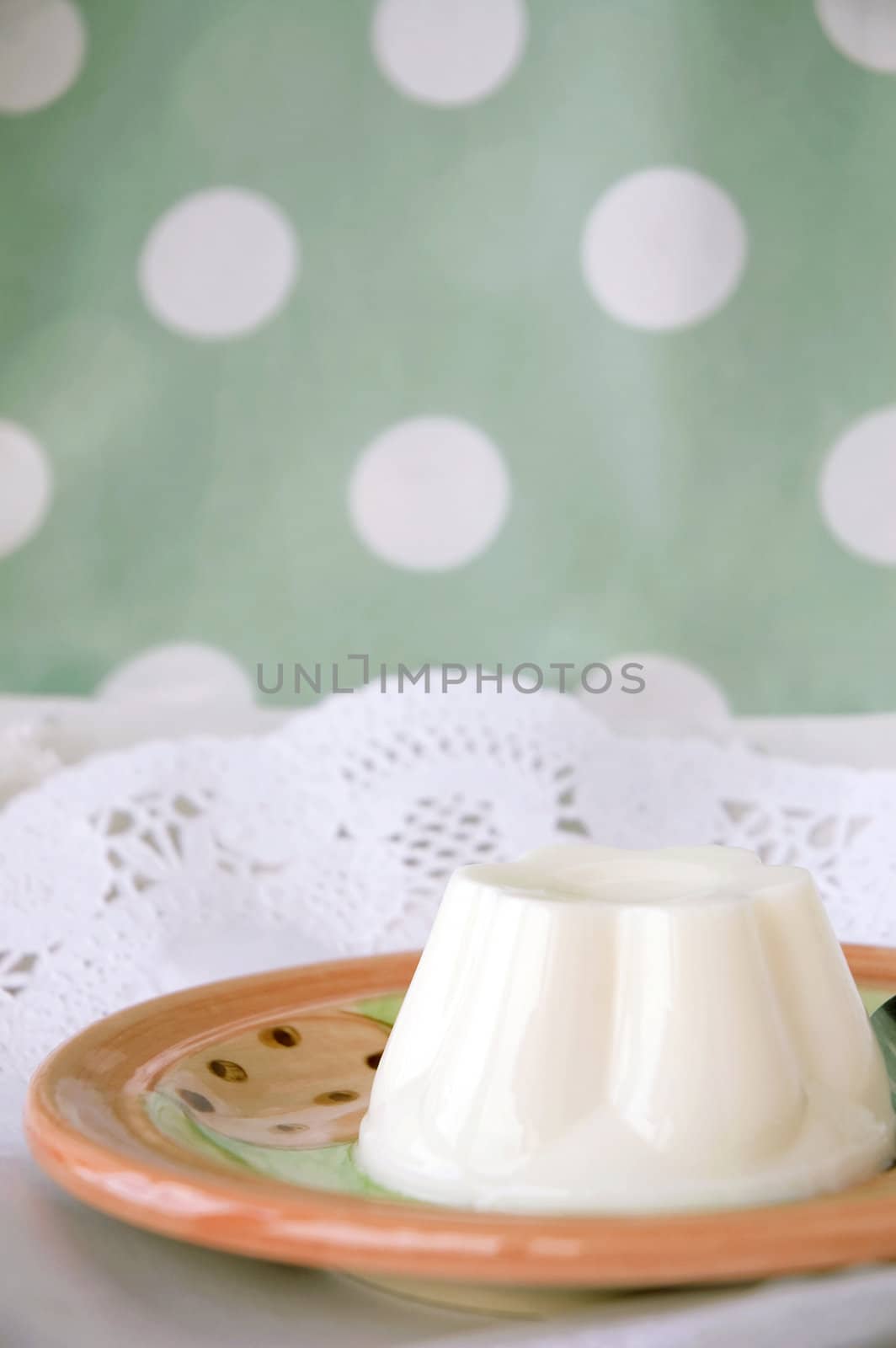 pudding on plate with sweet polka dots