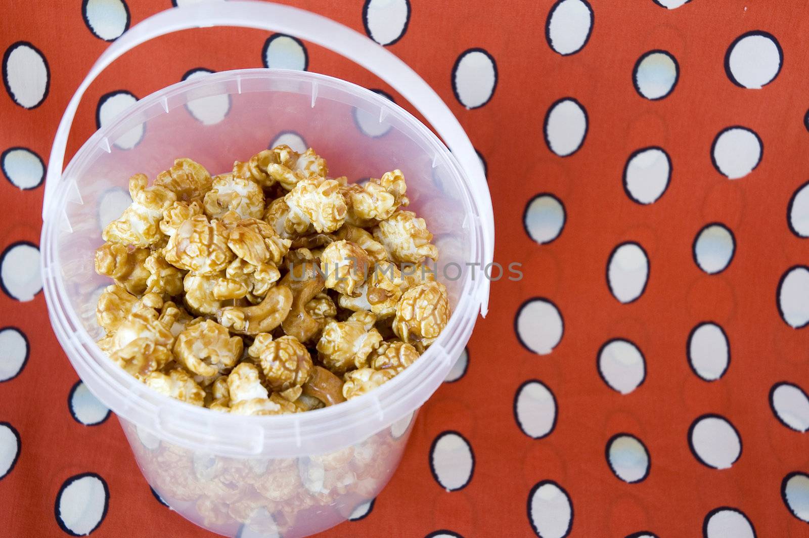 sweet caramel popcorn in bucket