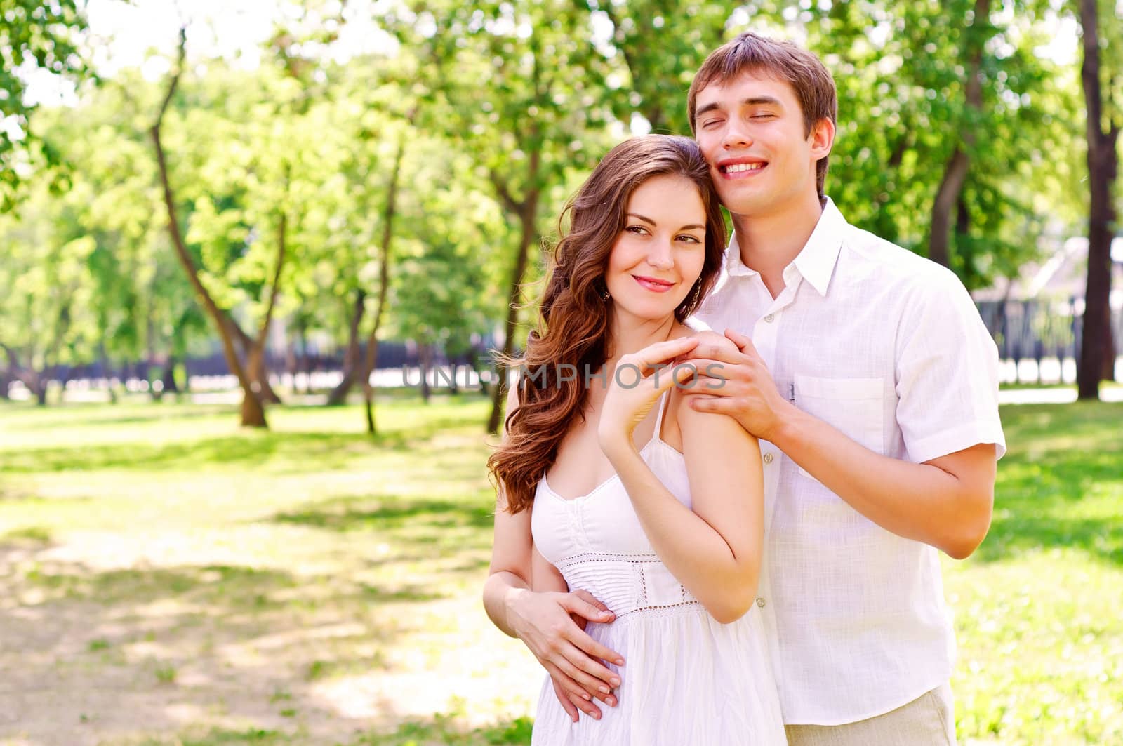 couple hugging in the park, have a good time together