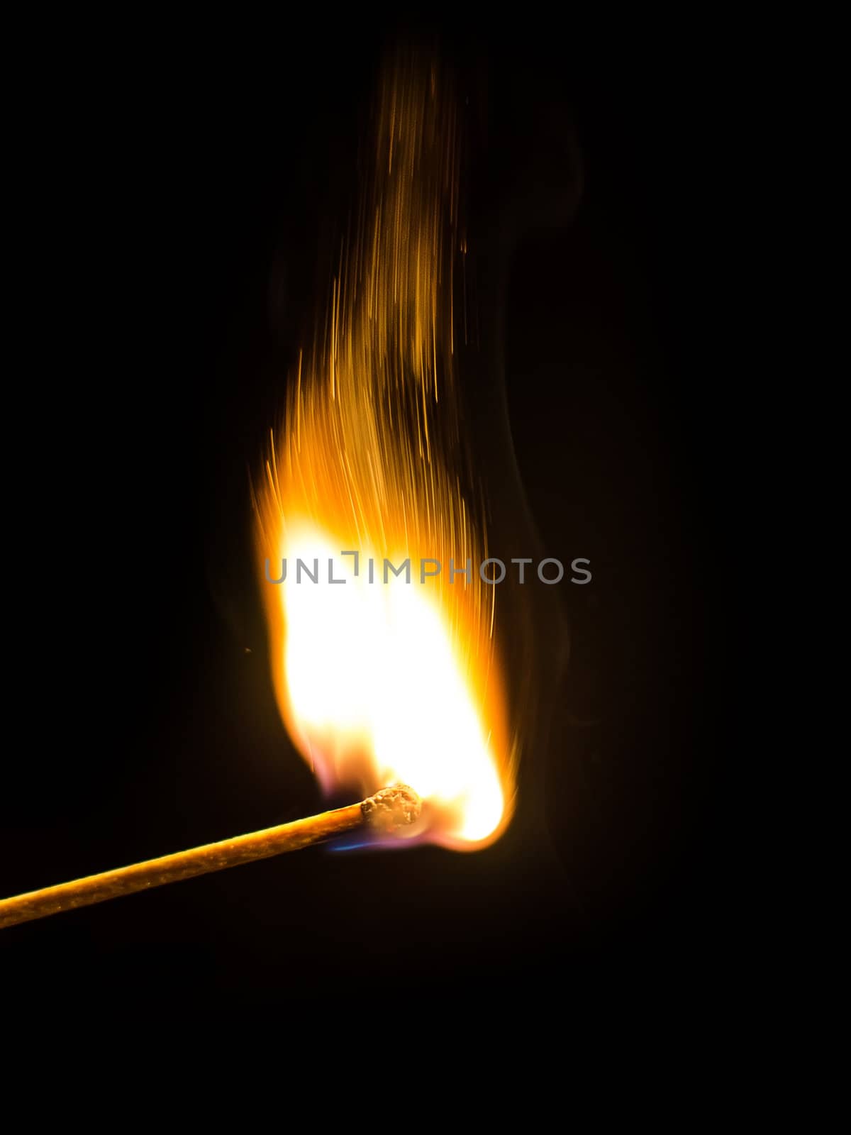 Burning match over black background by dmitrimaruta