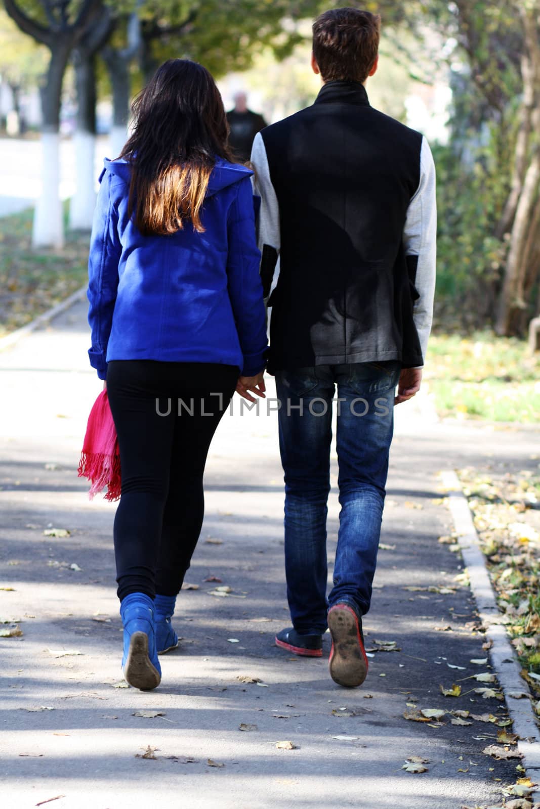 Beautiful loving couple going for a walk outdoors