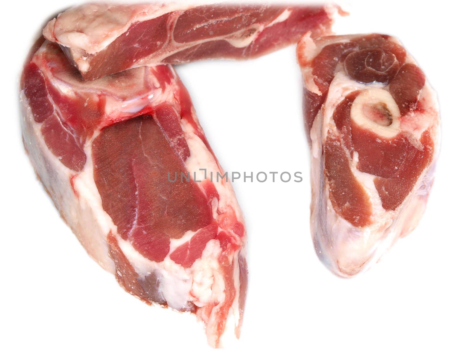 Raw meat, three pieces, isolated towards white background