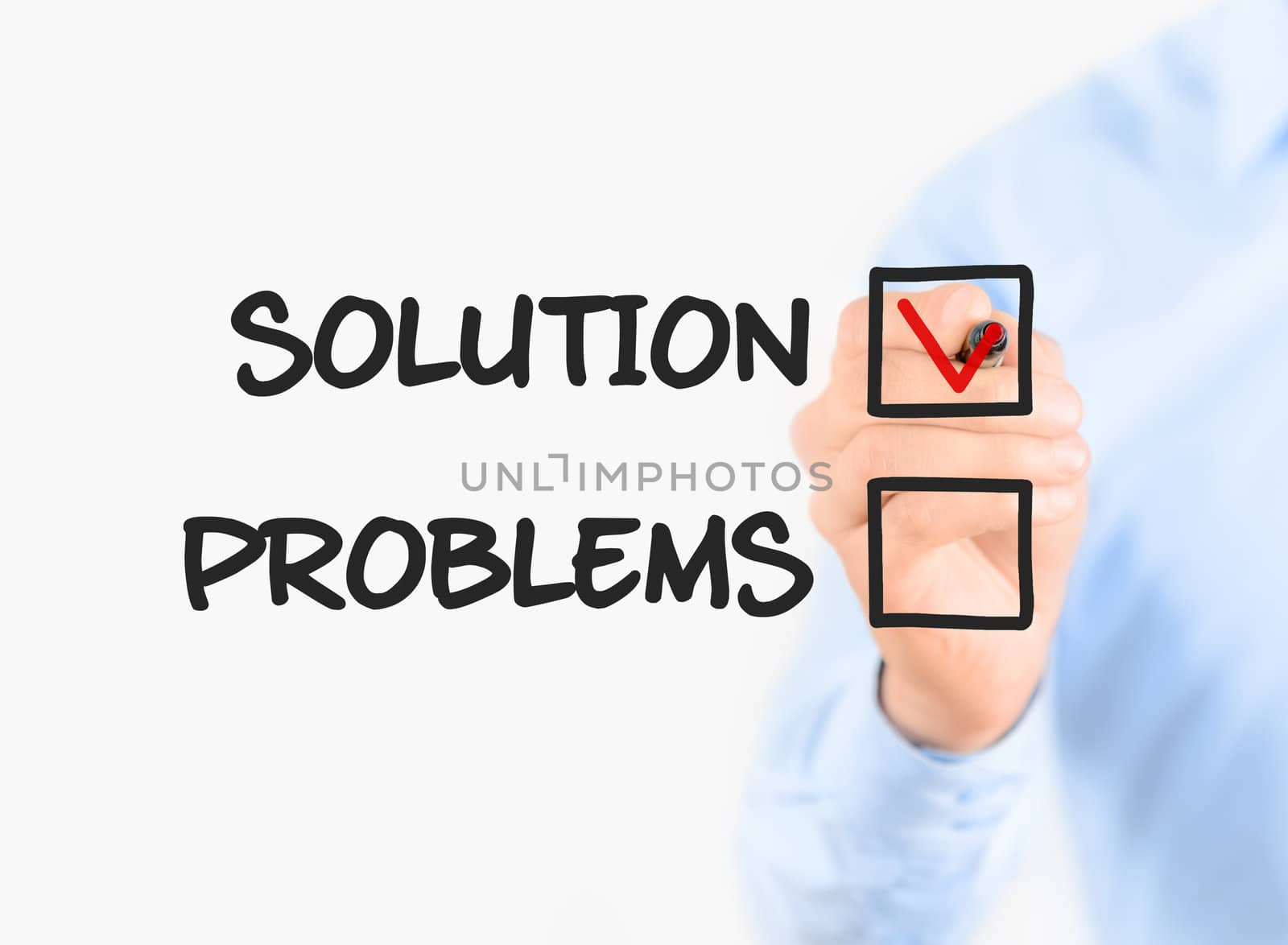Young businessman drawing focus on solution concept. Isolated on white.