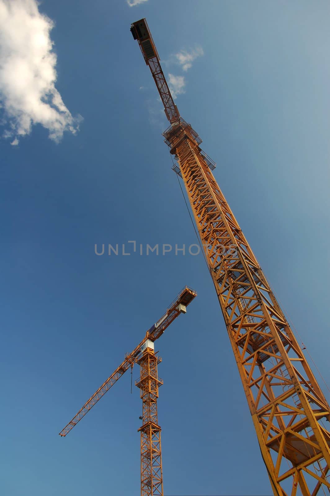 Two big cranes working on the central station of Linz/Upper Austria