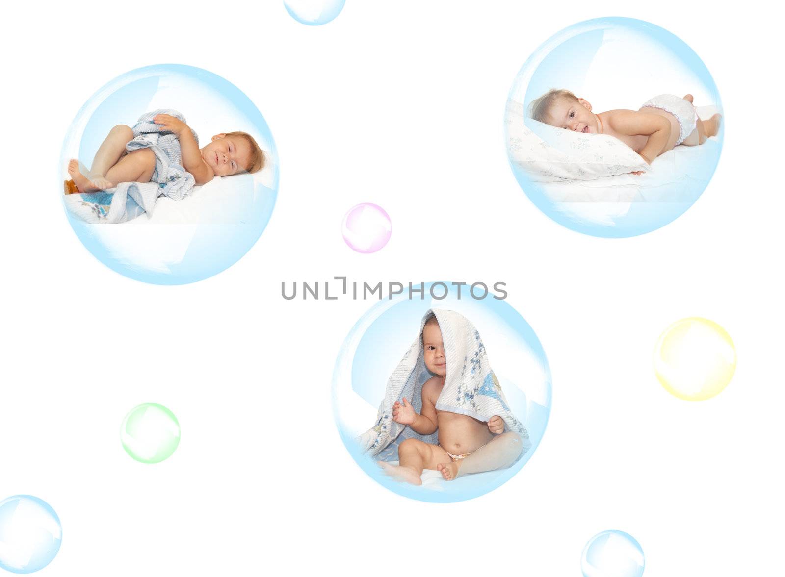 Soap bubble and child on a white background
