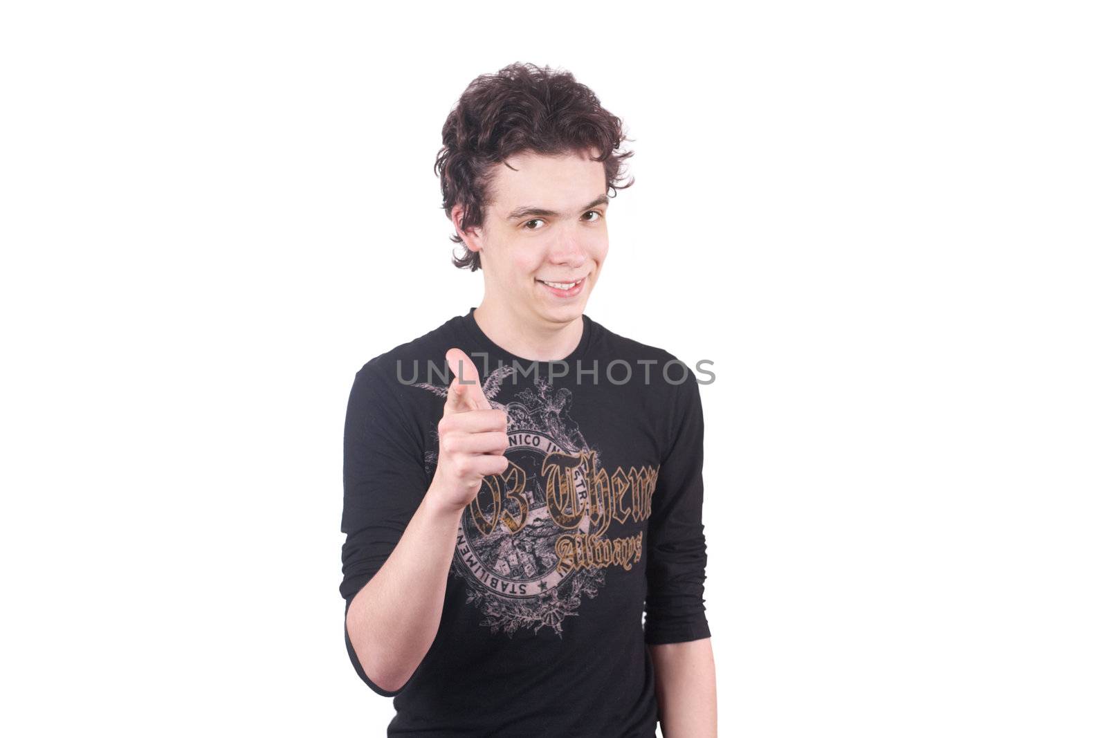 The boy shows by a finger on a white background