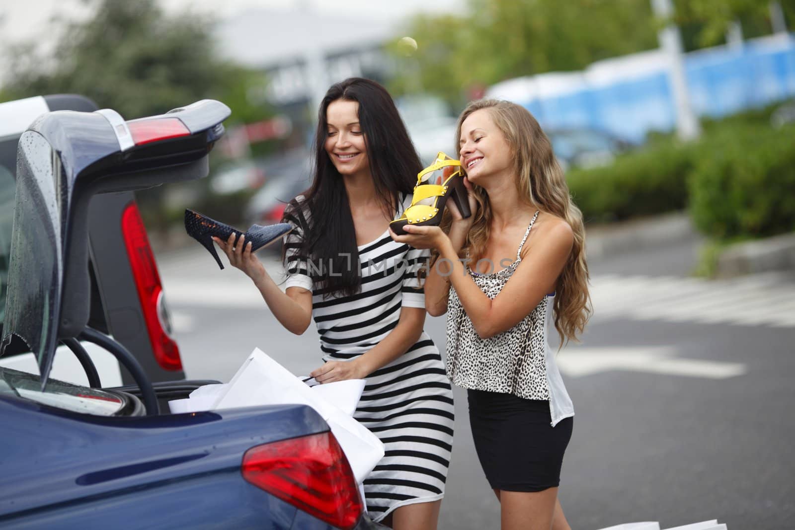 Two woman after shopping by Yellowj