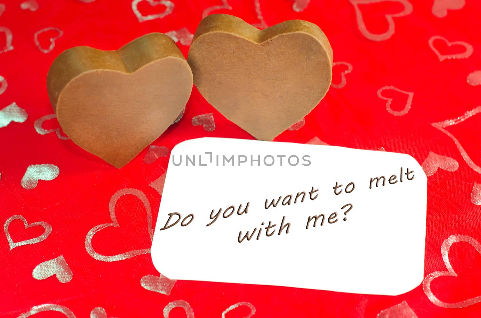 Valentine's image of two chocolate Hearts with message ad copyspace.