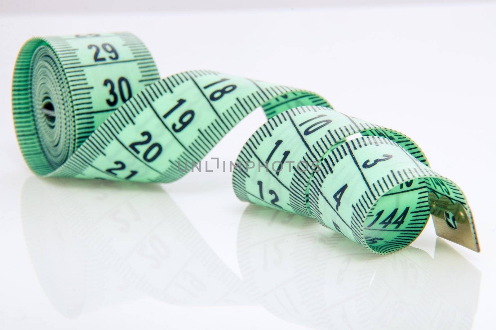An image of green centimeter on white background