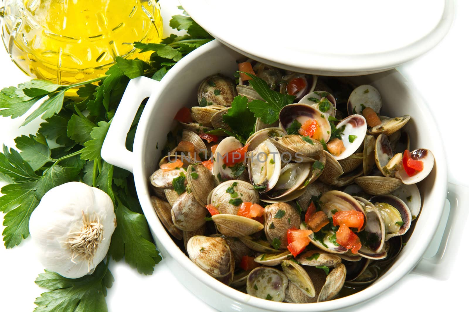 white bowl of clams soup on white background