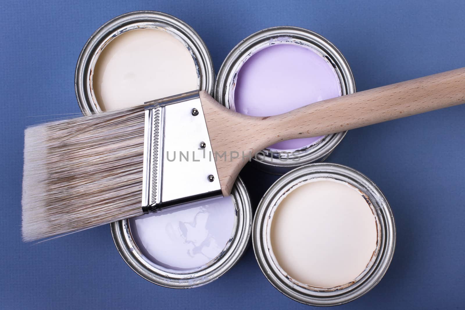 Latex brush and paint with blue background