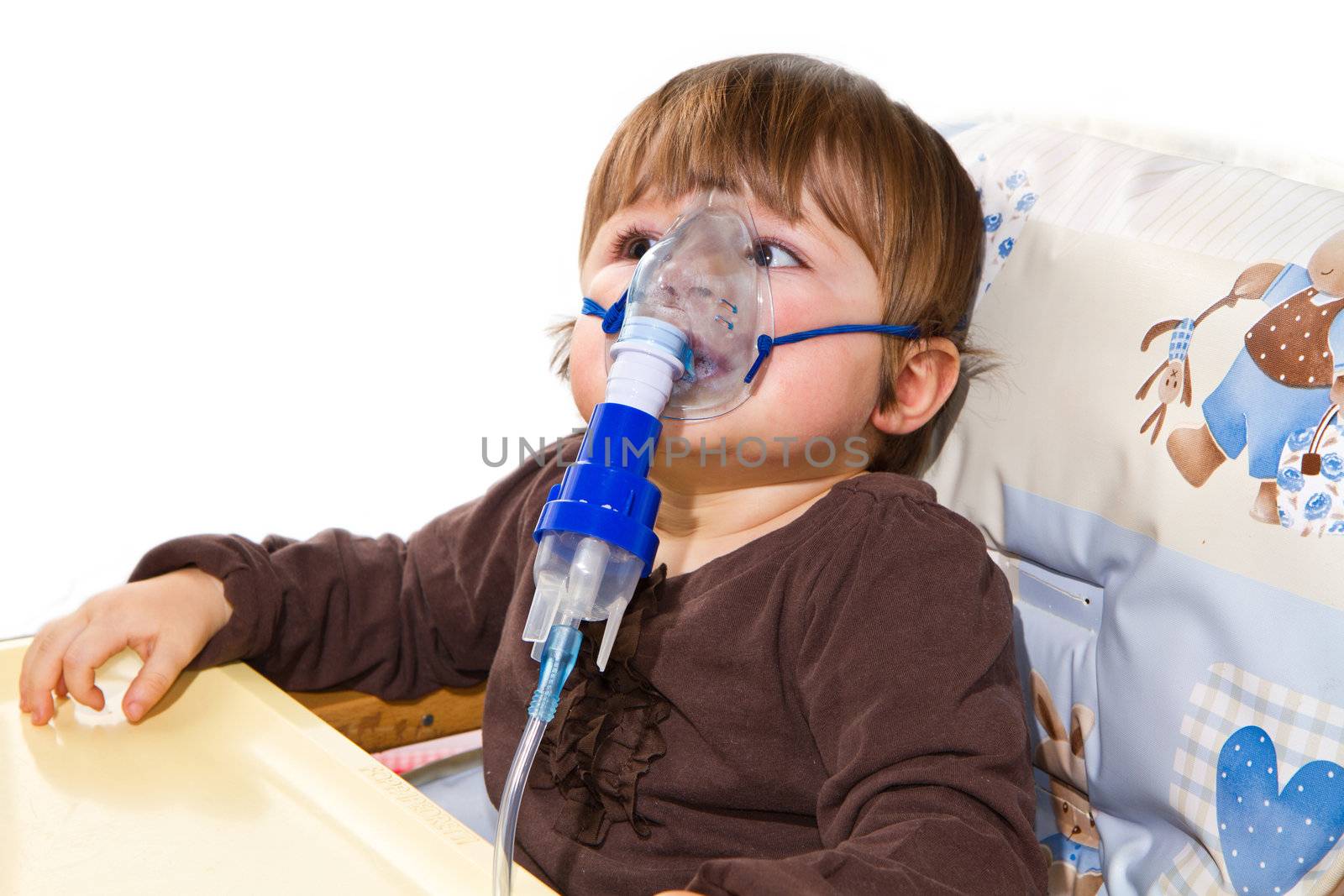 child taking respiratory, inhalation therapy by lsantilli