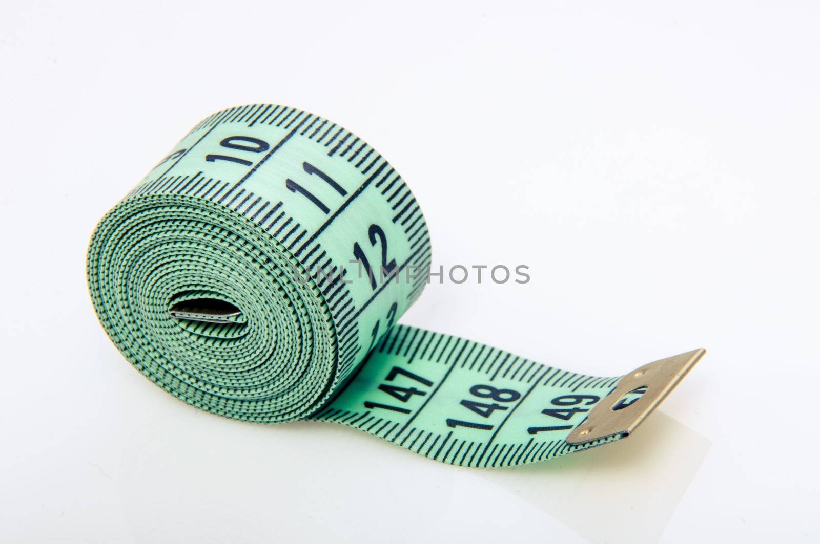 An image of green centimeter on white background