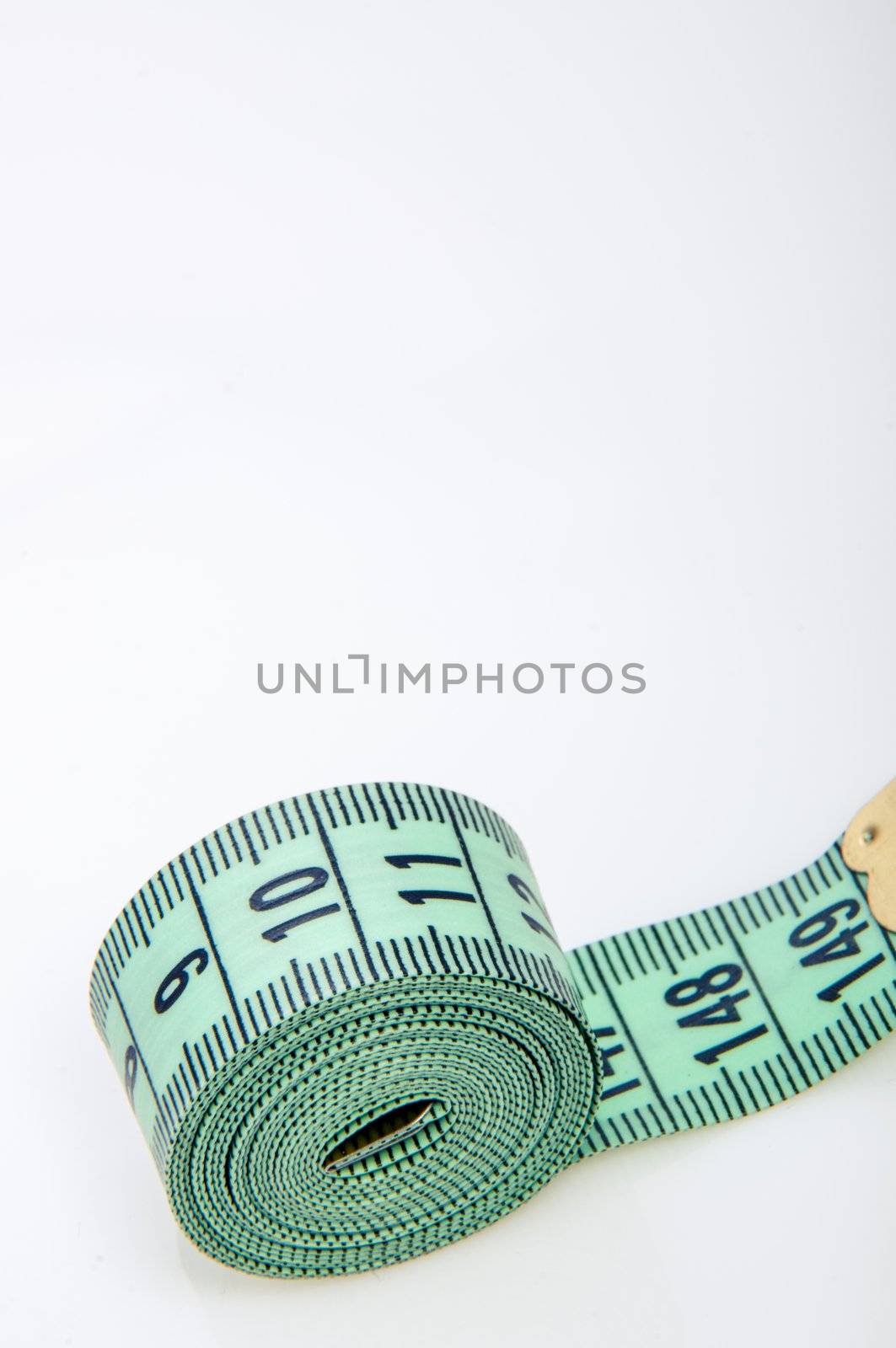 An image of green centimeter on white background