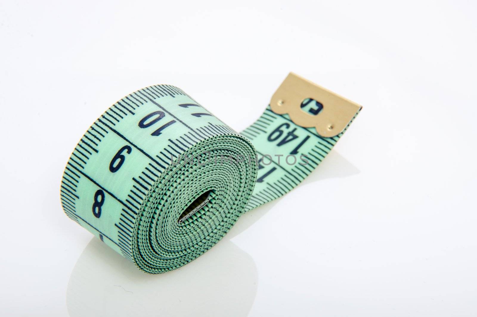 An image of green centimeter on white background