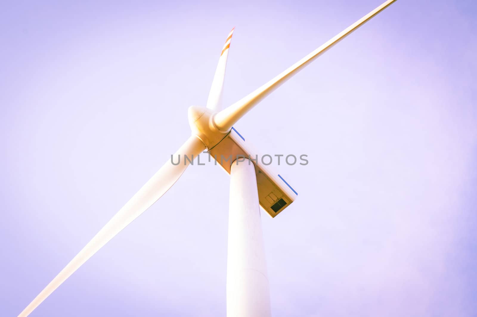 An image of windturbine of suny day