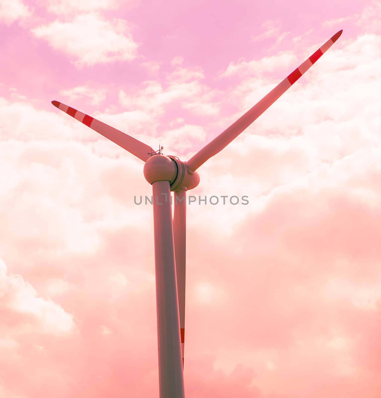 An image of windturbine against amazing sunset