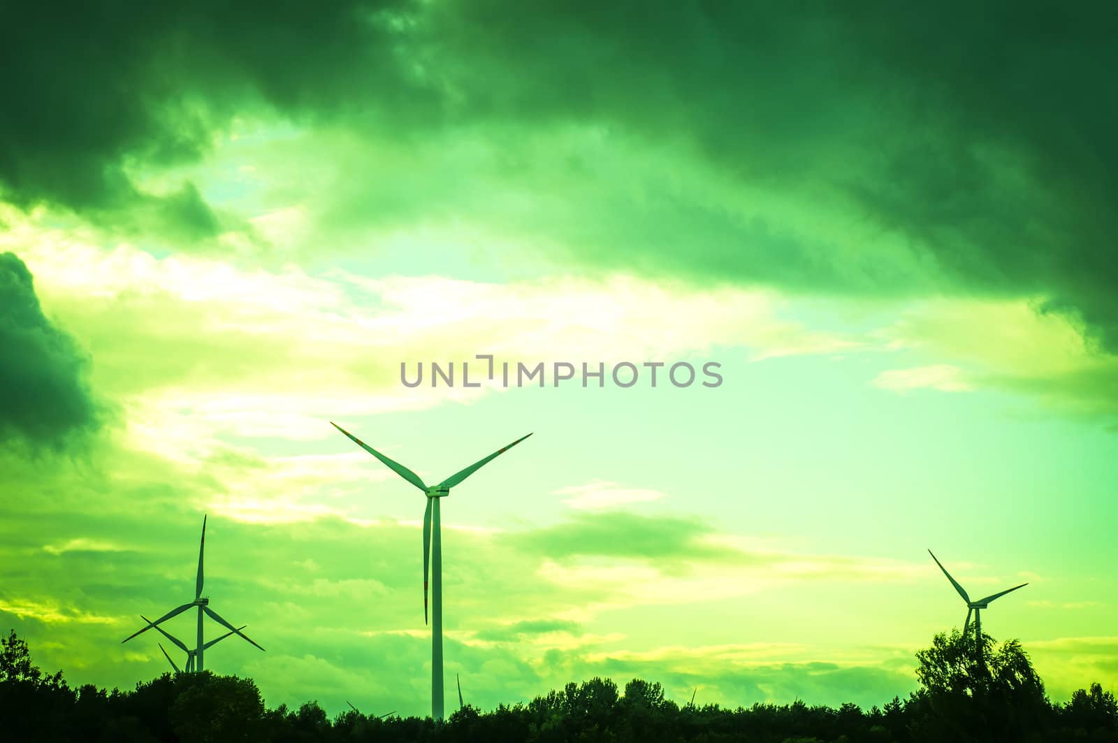 An image of windturbine during beautiful sunset