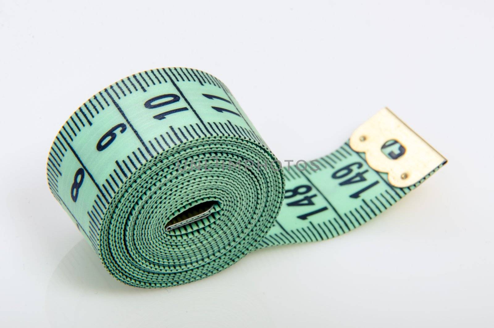 An image of green centimeter on white background