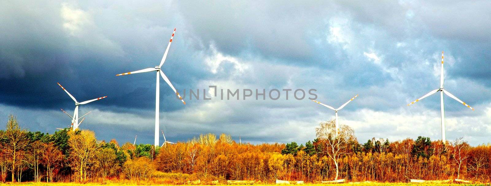 An image of windturbine of suny day