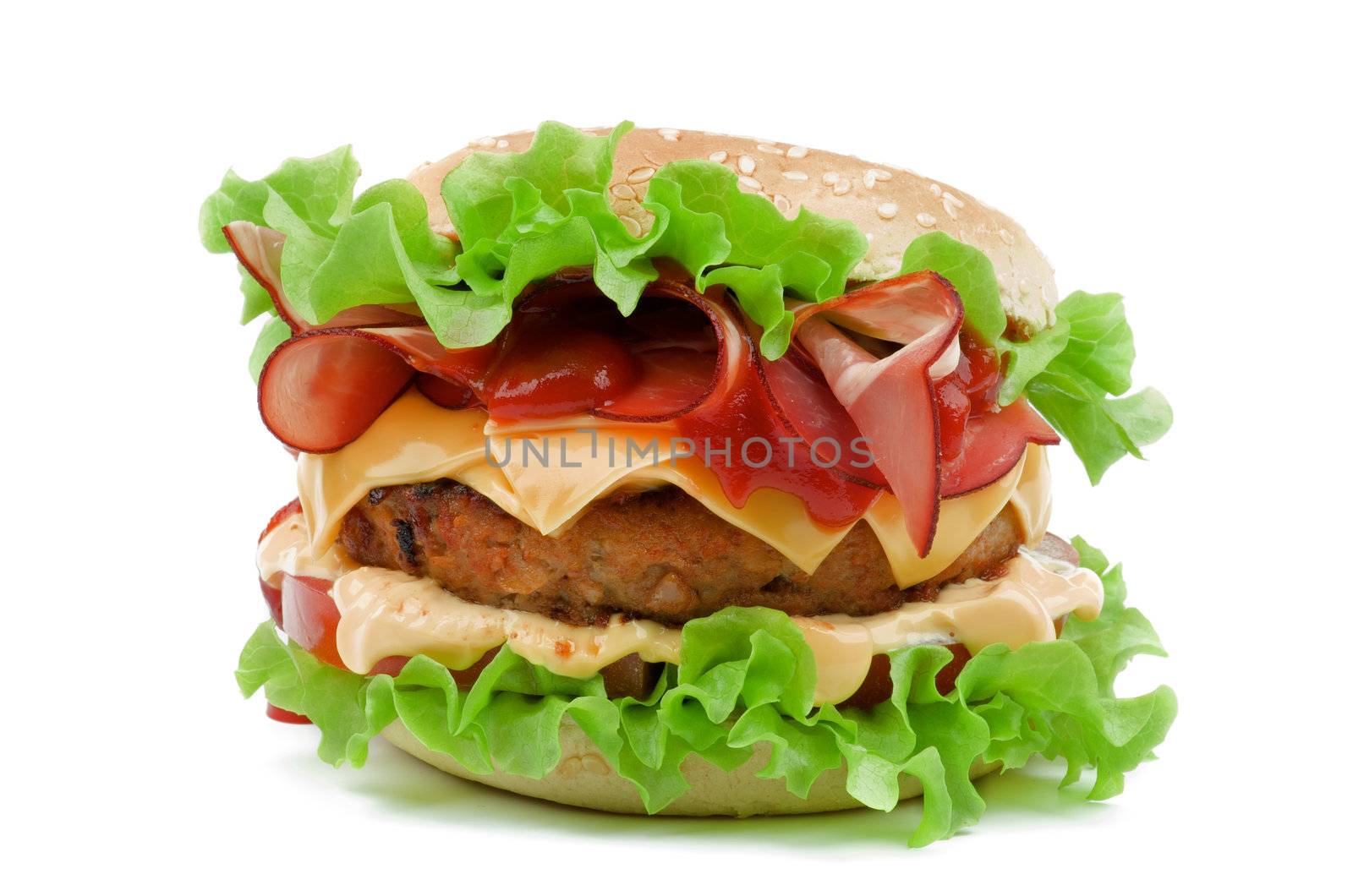 Delicious Hamburger with Bacon, Beef, Cheese, Tomato, Mayonnaise and Lettuce isolated on white background