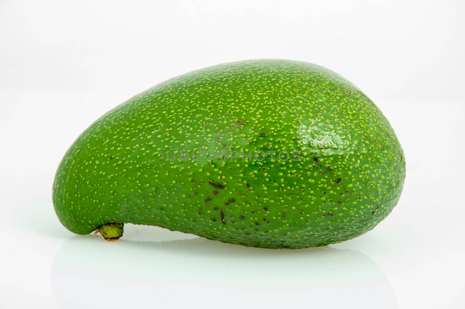 An image of avocado fruit isolated on white
