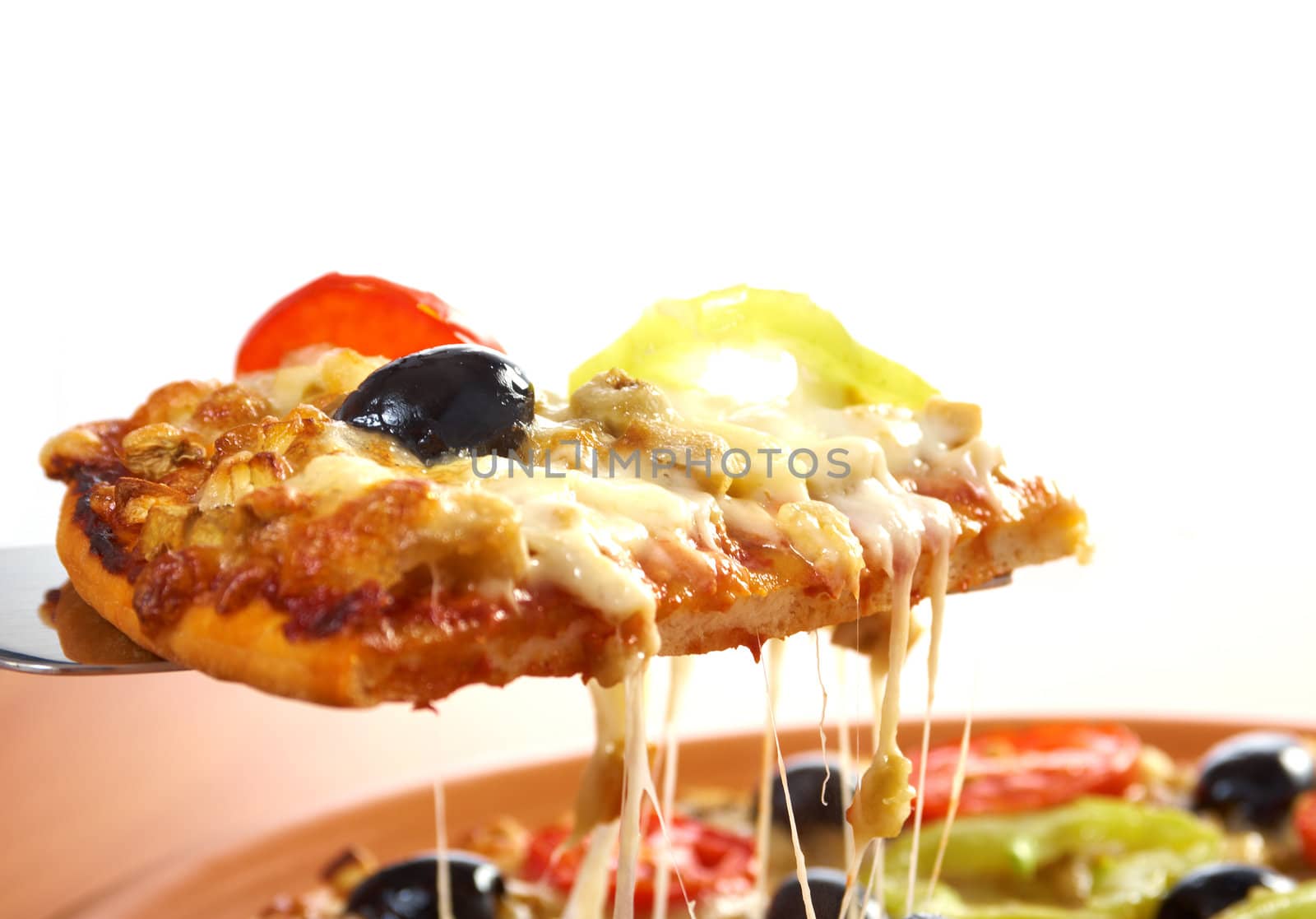 .home pizza with tomato and eggplant  Closeup .taking slice of pizza,melted cheese dripping. isolated on white background.