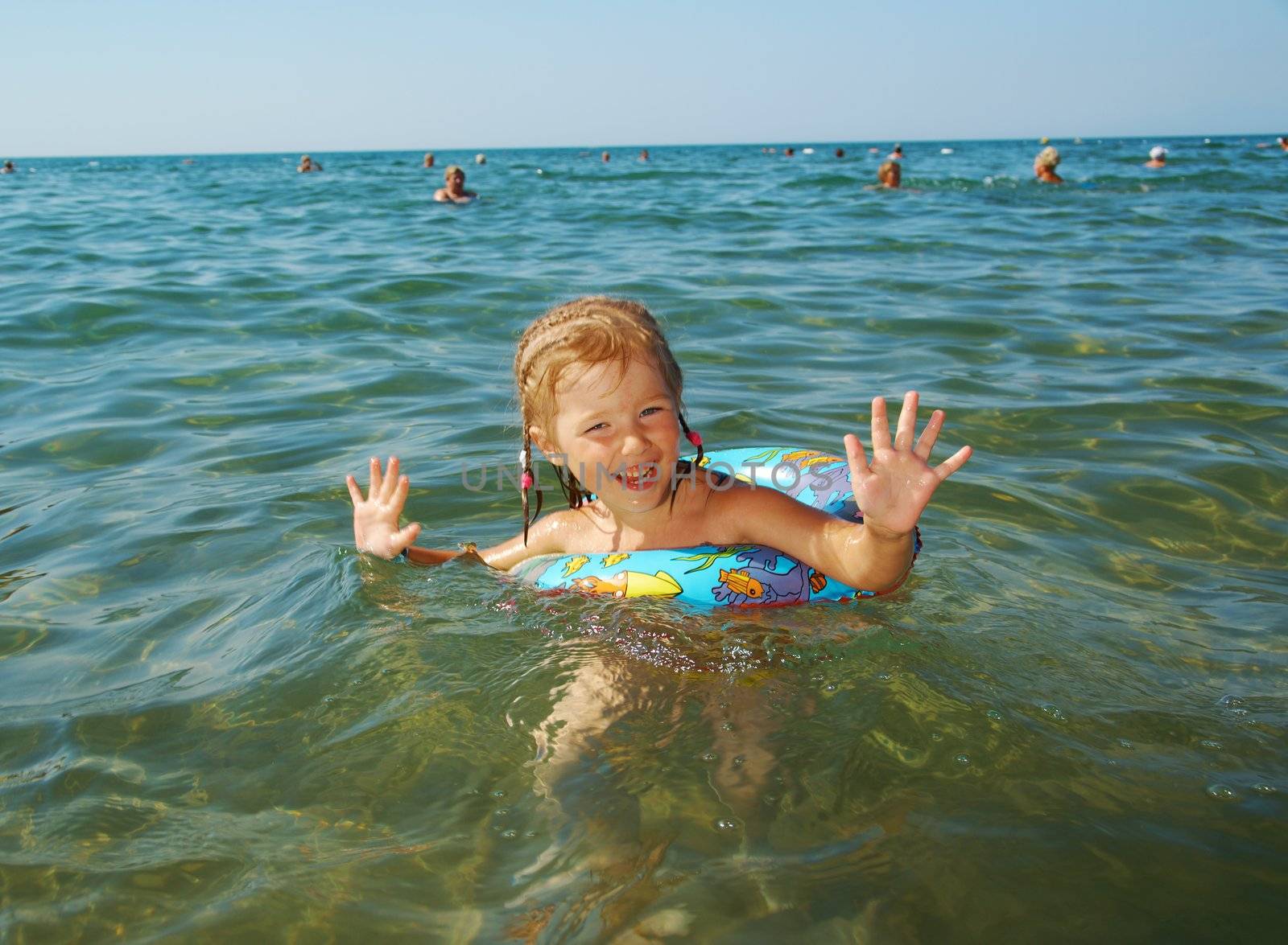 ittle girl on the beach by Fanfo