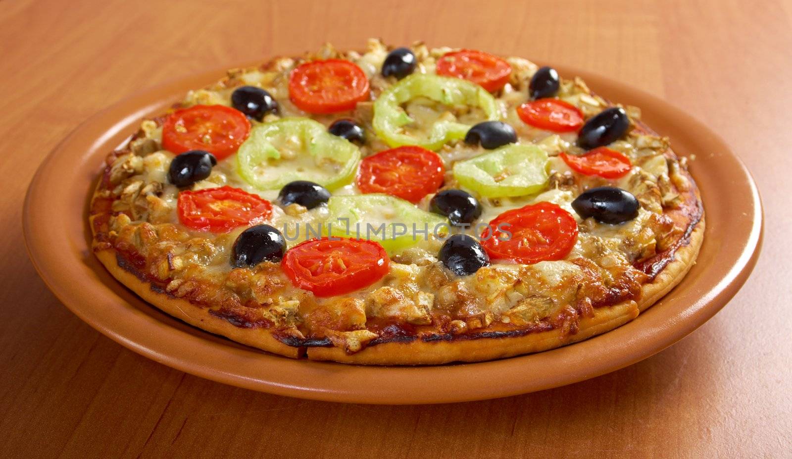 .home pizza with tomato and eggplant  Closeup 