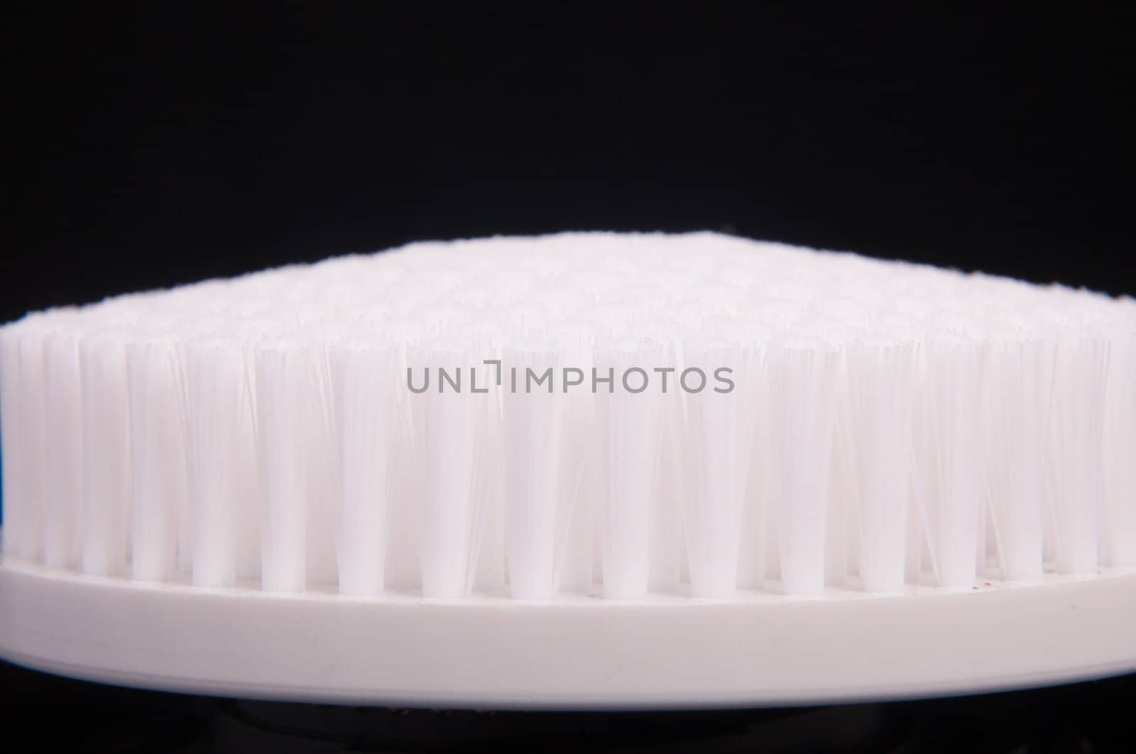 an image of white brush isolated on black