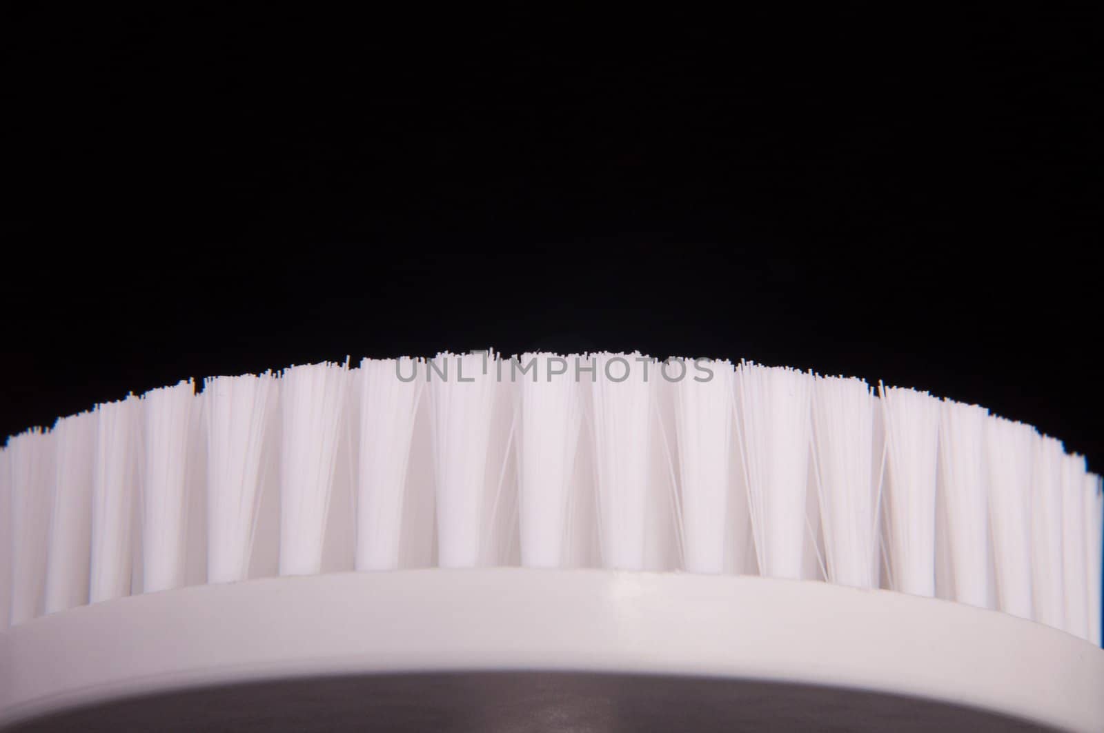 an image of white brush isolated on black