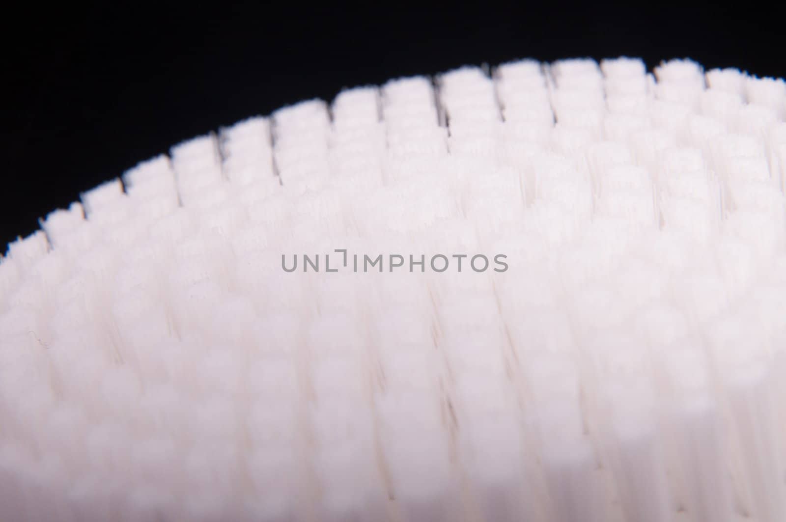 an image of white brush isolated on black
