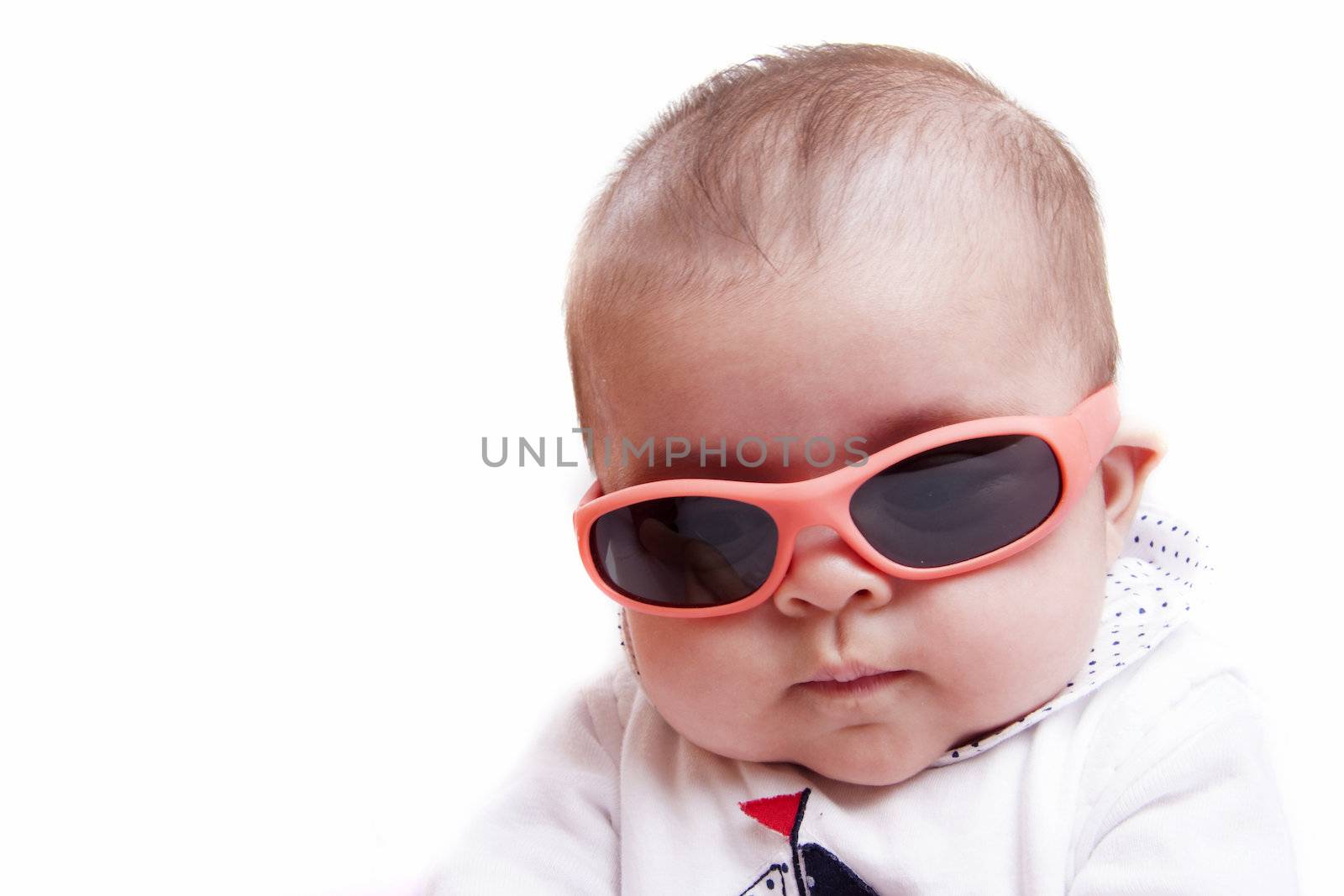 a little baby with sunglasses