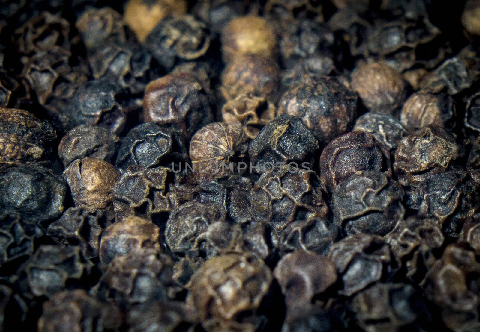 Close-up of lots of black pepper seeds