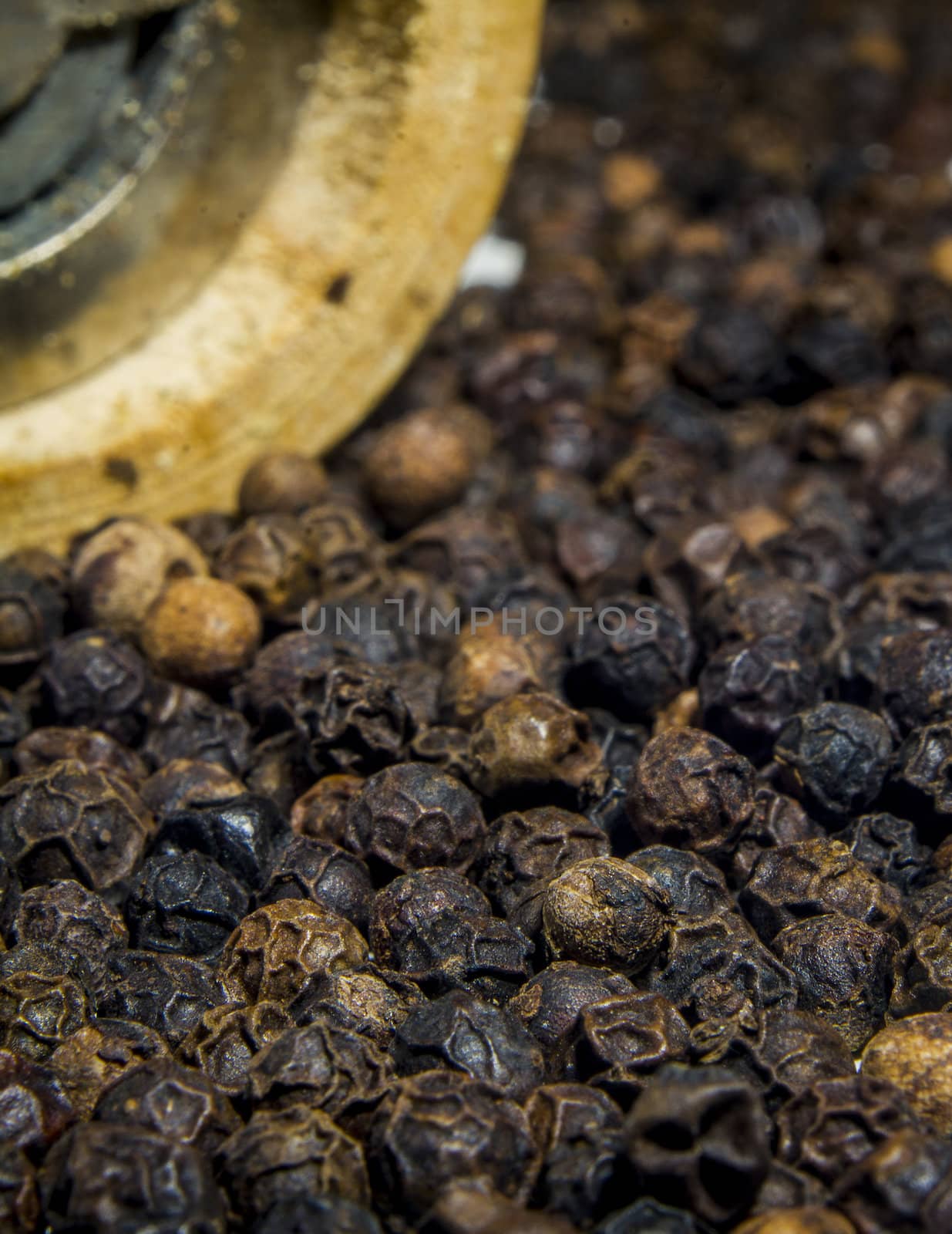 Close-up of lots of black pepper seeds