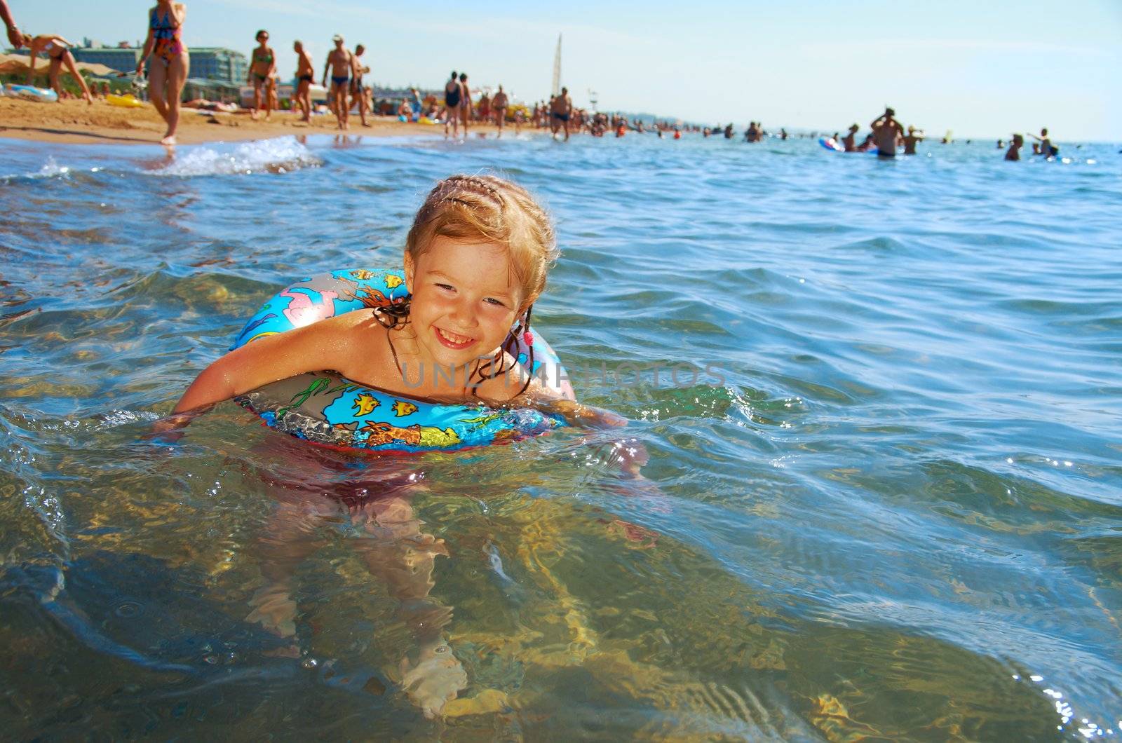 ittle girl on the beach.Mediterranean Resort Antalya Turkey