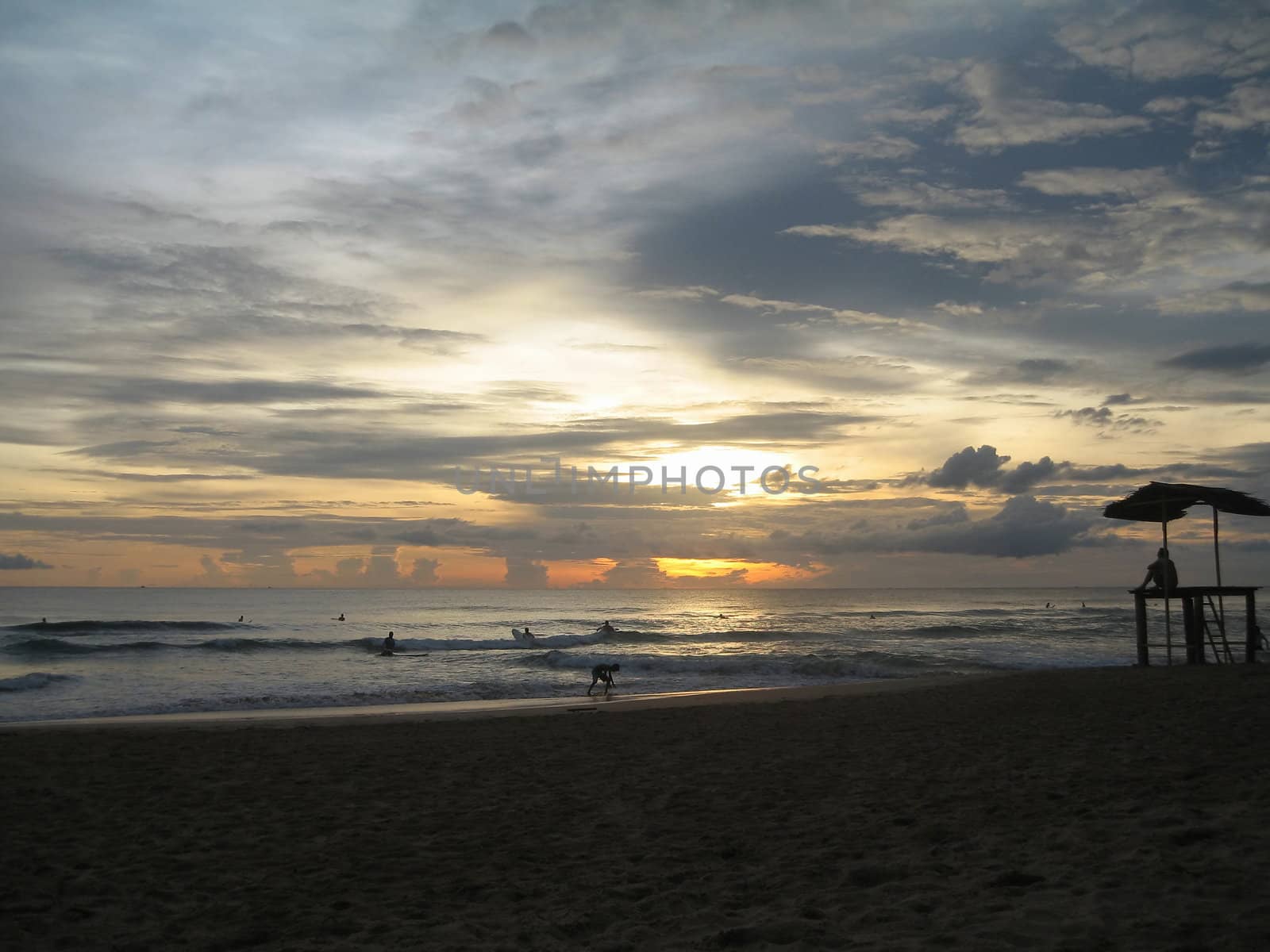 Evening swim in the ocean at sunset.